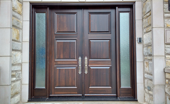 Front door in wooden bourassa